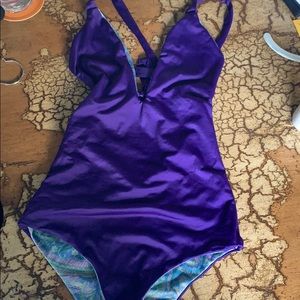 Reversible purple and paisley one piece swimsuit